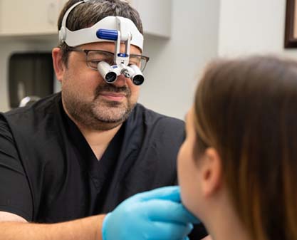 doctor examining patient